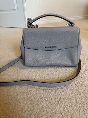Grey MichaelKors cross body handbag